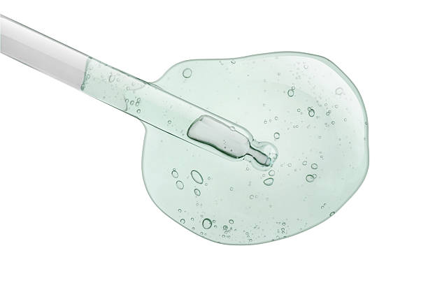 istock Pipette dropper with serum drops 2253631725
