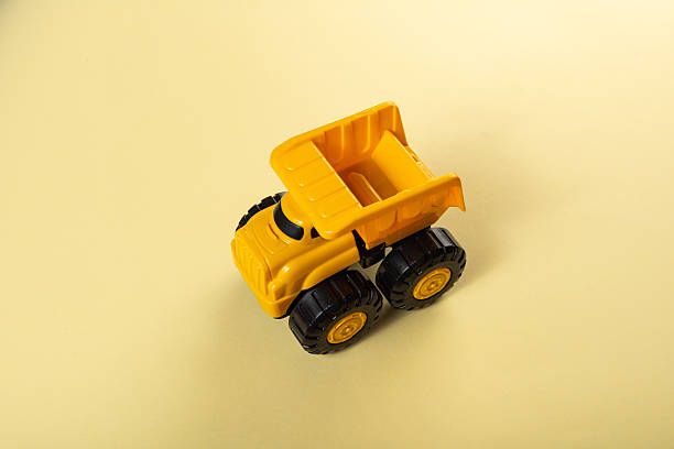 istock Colorful toys on a yellow background 2253632089