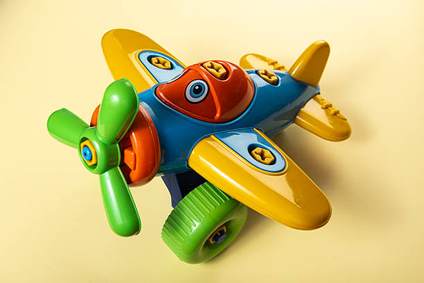 istock Colorful toys on a yellow background 2253632267