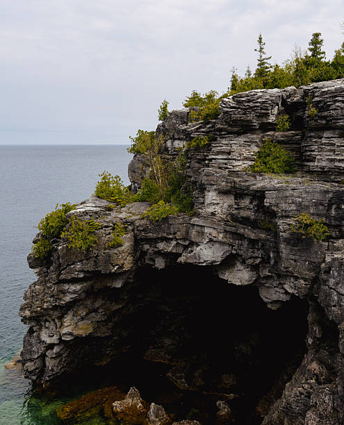 istock Sea cave in limestone cliff 2253632451