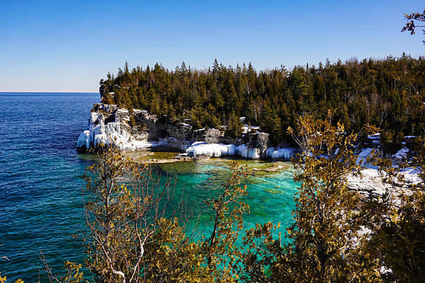 istock Sunny winter bay with turquoise water 2253632636