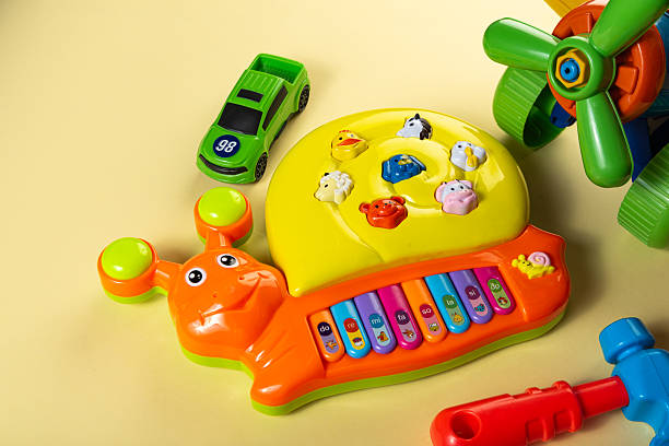 Colorful toys on a yellow background