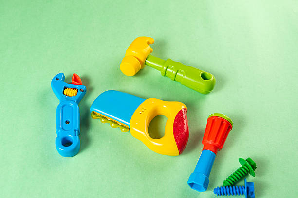 istock Colorful toys on a green background 2253632737