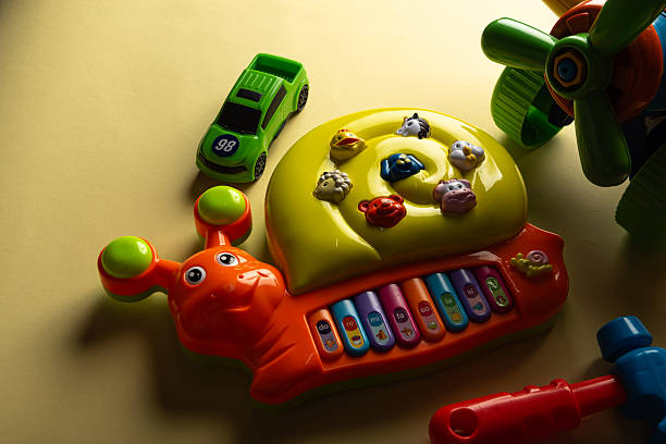 Creative flat lay of school supplies, toys, and learning tools for children. Perfect for back to school and early education concepts.