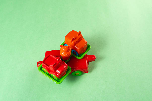 Colorful toys on a green background