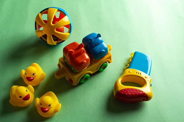 istock Colorful toys on a green background 2253633400
