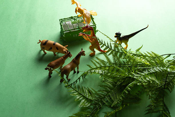istock Colorful toys on a green background 2253633530