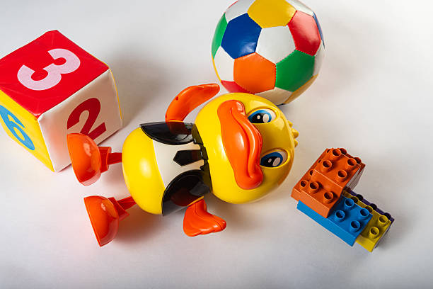 Creative flat lay of school supplies, toys, and learning tools for children. Perfect for back to school and early education concepts.