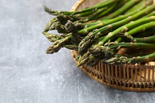 istock Fresh green asparagus on the table 2253633711