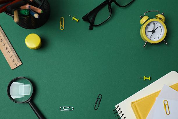 istock Flat lay with school stationery on green background, top view 2253634503
