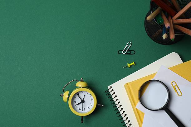 istock Flat lay with school stationery on green background, top view 2253634515