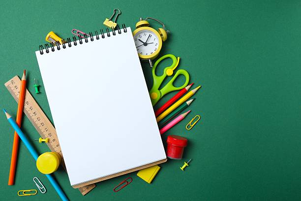 istock Flat lay with school stationery and notebook on green background, top view 2253634521