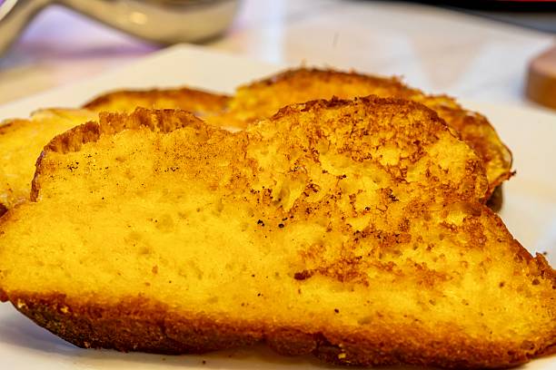 Homemade Challah French Toast on a white plate