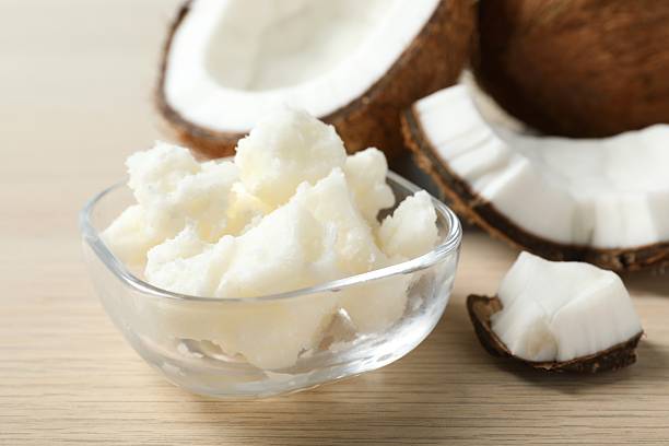 istock Bowl of coconut oil on table 2253635771