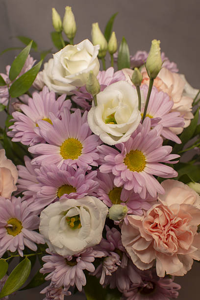 istock Graceful bridal arrangement featuring pastel daisies and roses 2253638062