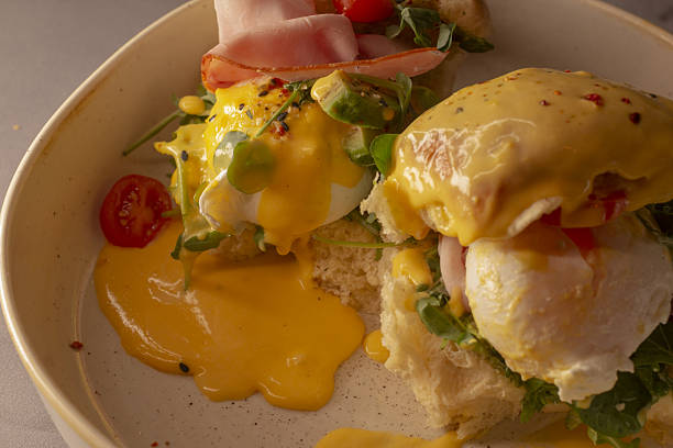istock Warm cafe ambiance complements flavorful egg benedict experience 2253643351
