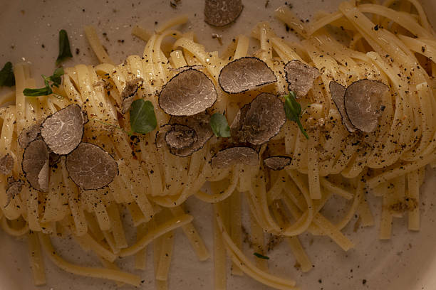 Luxurious tagliatelle featuring smooth butter and aromatic pepper