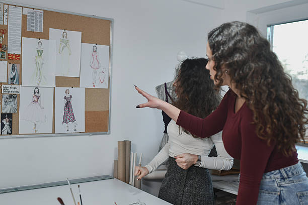 istock Fashion Atelier Workflow With Hands-On Collaboration Between Designer And Assistant 2253648791