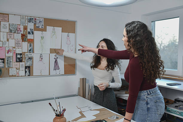 istock Atelier Scene Showing Teamwork Between Designer And Assistant 2253648815