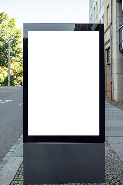 istock Large outdoor digital advertising billboard mockup with blank white screen 2253649206