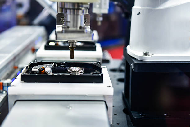 istock Inspecting hard disk drives in the production line 2253657282
