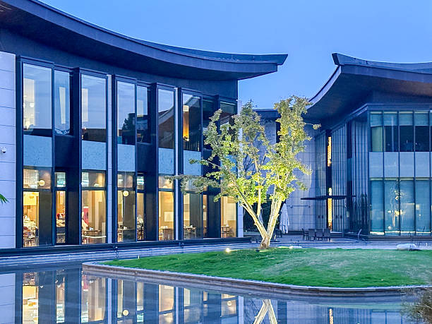 istock Modern Glass Building With Water Reflection 2253658670