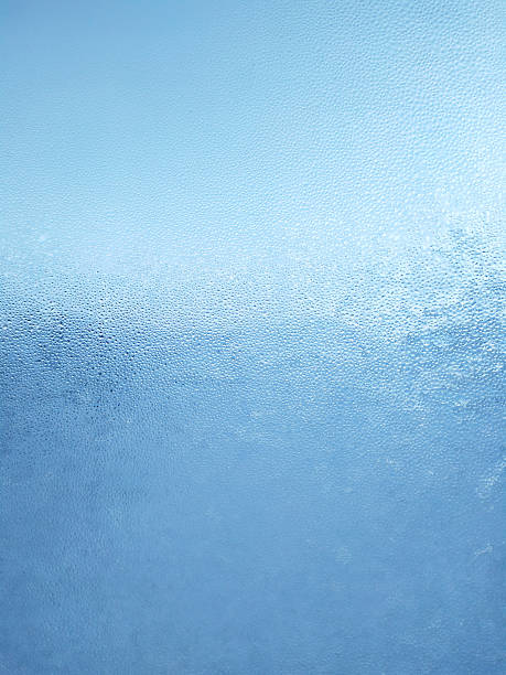 istock Texture of fogged glass, abstract blue background. 2253659740