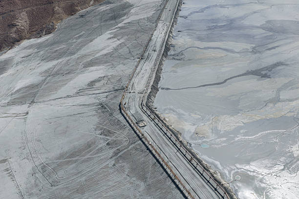 istock View of a huge mining tailings dam with spread inert material and profiling 2253660350
