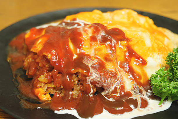 istock Delicious-looking omelette rice, freshly prepared with ketchup 2253662219