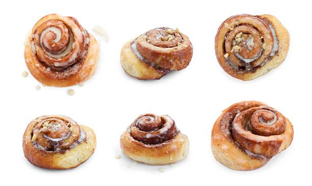istock Tasty cinnamon rolls isolated on white, set 2253664525