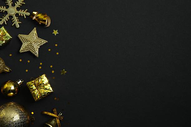 istock Beautiful Christmas decorations on black background 2253667376