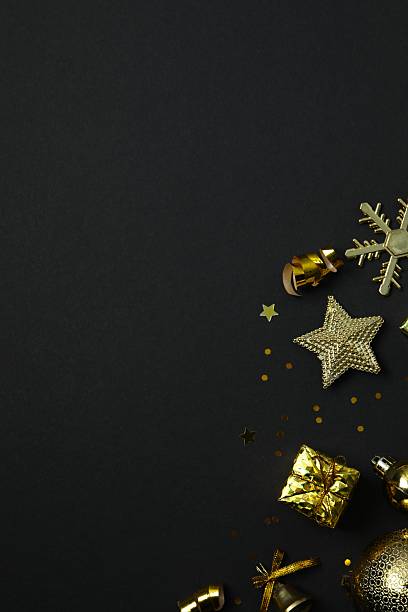 istock Beautiful Christmas decorations on black background 2253667383