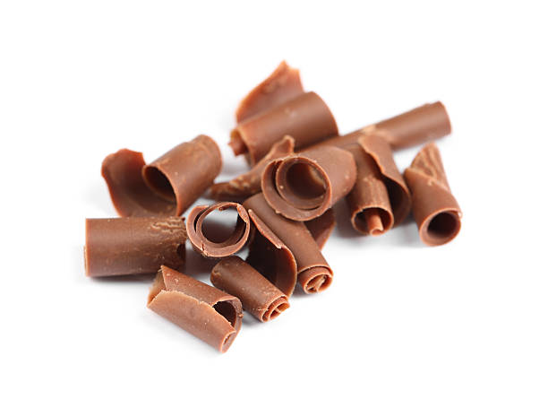 istock Many delicious chocolate shavings isolated on white 2253667552