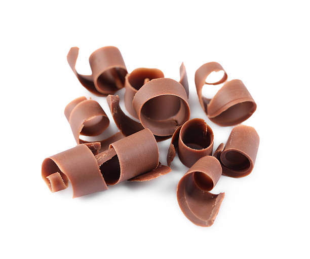 istock Many delicious chocolate shavings isolated on white 2253667564