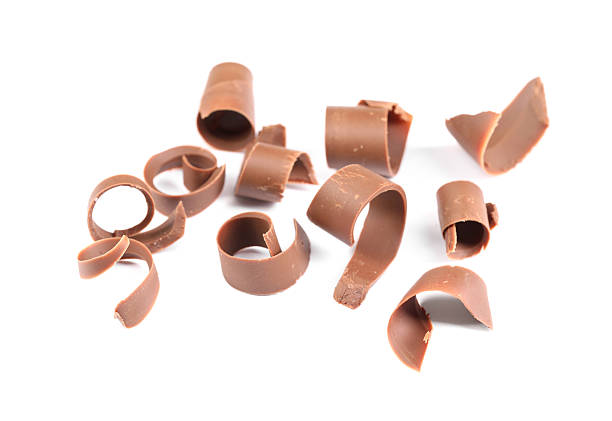 istock Many delicious chocolate shavings isolated on white 2253667570
