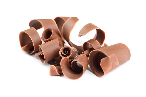 istock Many delicious chocolate shavings isolated on white 2253667571