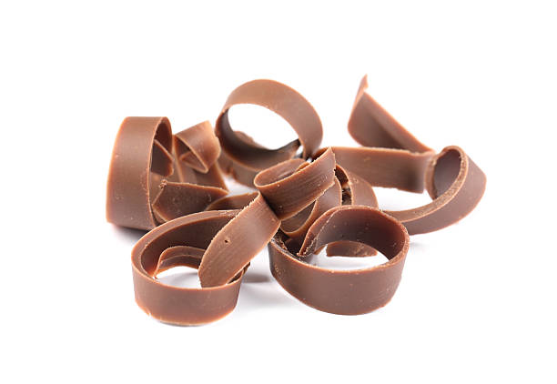 istock Many delicious chocolate shavings isolated on white 2253667617