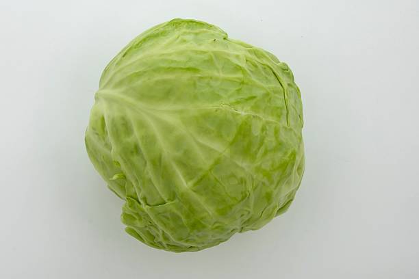 istock Fresh raw green cabbage with natural leaf texture isolated on white background 2253674009