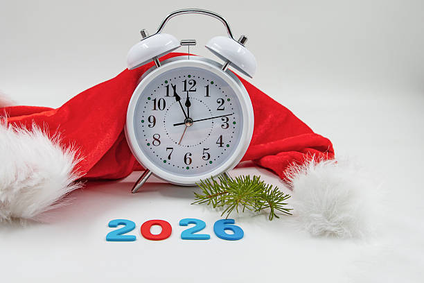 istock New year 2026 concept with alarm clock Santa hat countdown planning time 2253680554