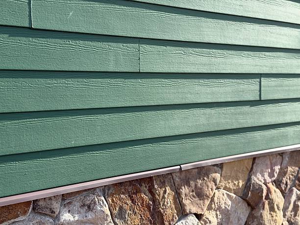 istock Green Vinyl Home Siding 2253681843