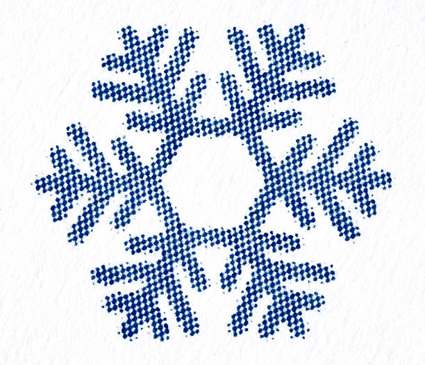 Close-up of a blue dotted halftone snowflake with a hollow center on white textured paper