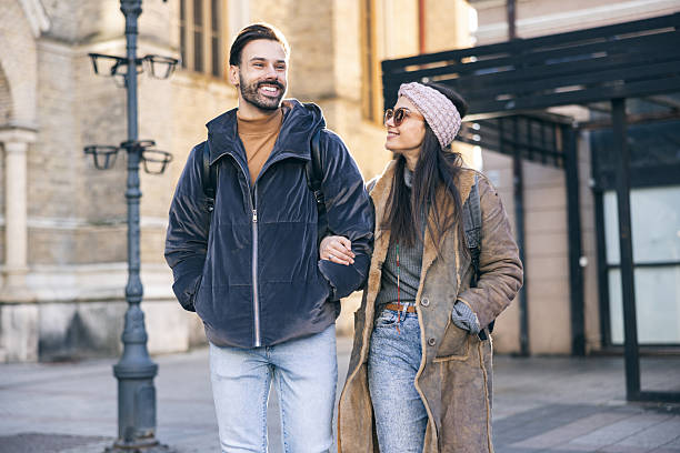 istock Tourist Couple Exploring City 2253683176