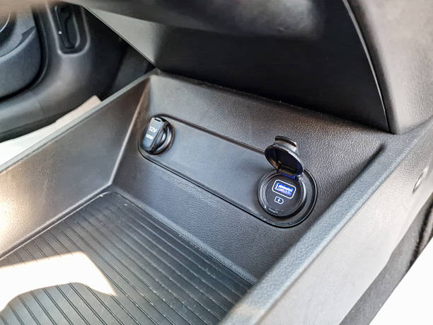 istock Modern car interiors feature stylish designs with practical USB ports and accessory sockets, greatly enhancing convenience and comfort for drivers and passengers during their journeys 2253688965