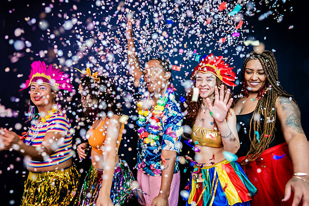 istock Excited friends dancing and enjoying Carnival - Studio Shot 2253691639