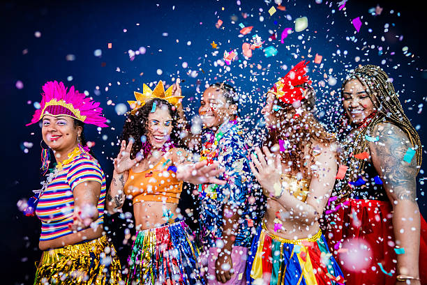 istock Excited friends dancing and enjoying Carnival - Studio Shot 2253691669