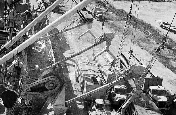 Puerto Cabello, Venezuela, - circa 1975: unloading of Mack trucks at port