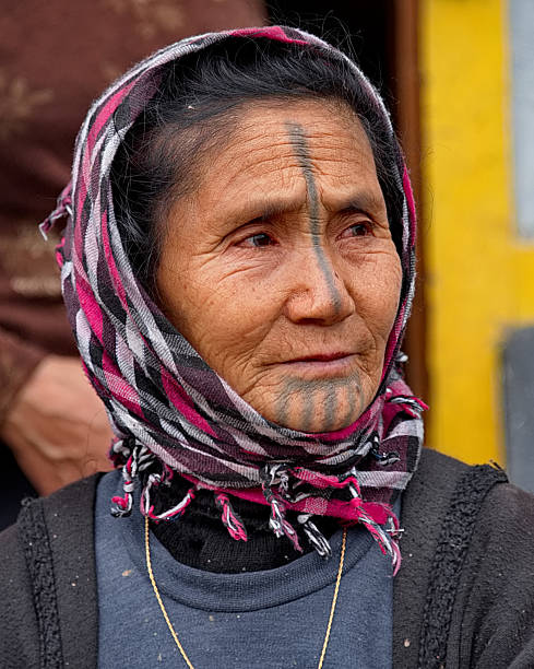 Ziro, India. February 06, 2016. Portrait of an elderly woman of the amazing Apatani tribe with a tattooed face. tattoos were applied as a protection against the theft of beauties by neighbors.