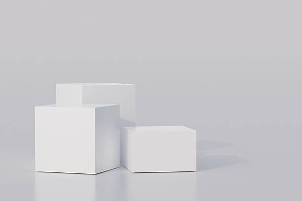 istock White Podium studio and cube pedestal on white background with product shelf on one white floor and wall the platform for product presentation minimal style, copy space, abstract podium. 3D render. 2253696169