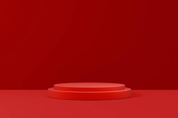 istock 3d red podium stage platform with copy space. modern minimal studio light advertising concept. clean branding scene for cosmetic perfume tech product display banner. 3d render. 2253698298