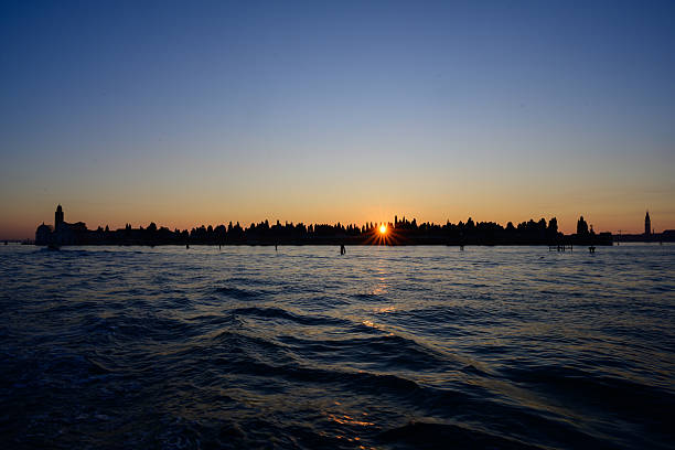 Sunrise behind San Michele Cemetery Island in Venice